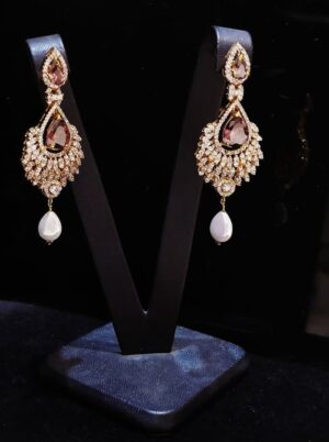Gold Pated Earrings with premium quality Zircons and hanging Pearls.
